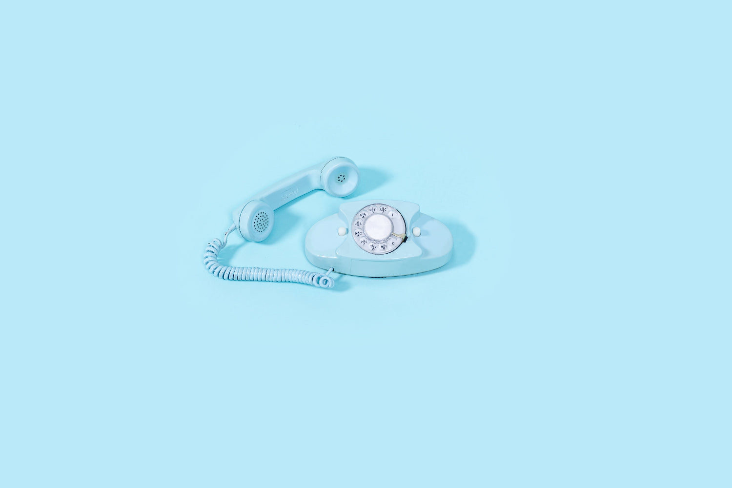 Image of phone on blue background, Contact Us about Candles, Eastern Shore, how to contact eastern shore candle company, phone orders, online candle store